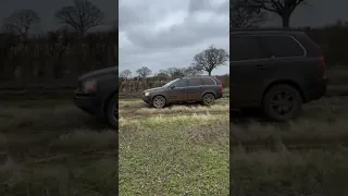 A stuck 4x4 Volvo tries to WHEELSPIN its way out of a mud field (no diff lock)