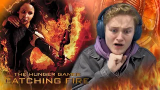 I watched THE HUNGER GAMES for the FIRST TIME and it's SHOCKING (CATCHING FIRE REACTION)