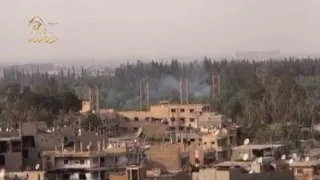 Syria War: Amateur footage shows air strikes and a bridge collapsing