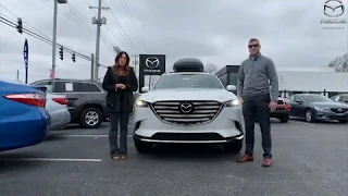 Connecting Apple CarPlay on a 2020 Mazda CX-9, For Sale, at Oxmoor Mazda in Louisville, KY