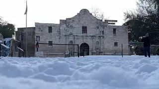 Residents, visitors in awe of The Alamo covered in snow