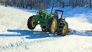 When Logging Gets Dangerous! Winching Huge Logs With a Tractor!