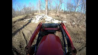 #8 Rural king rk55 tractor loader work moving concrete and dirt to creek