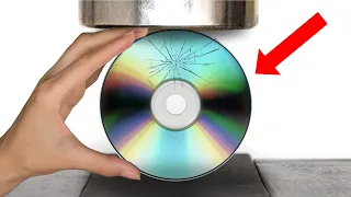 Hydraulic Press VS Stack Of CD's