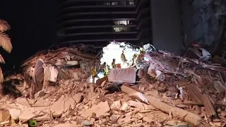 Part of 12-story apartment building collapses near Miami