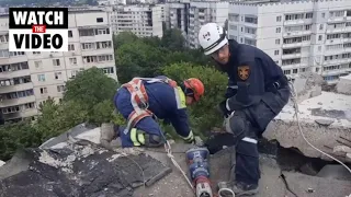 Canadian crew help to restore building damaged by shelling in Kharkiv