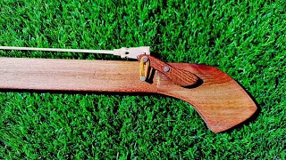 Slingshot with wooden trigger (wonderful and practical combination of wood, rubber and nails)