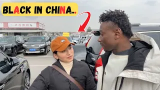 chinese girl excited to see black guy and sing a song for him in a car market she later said this.