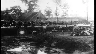 People evacuate a village in Belgium during World War I. HD Stock Footage