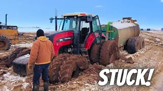 How are we going to get this stuck tractor out?