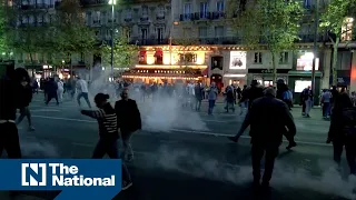 French police use tear gas and water cannon at banned pro-Palestinian rally