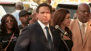 Ron DeSantis booed & heckled at vigil as hundreds mourn more racist killings