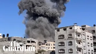 Footage captures the moment of an airstrike from inside a nearby building