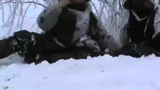 War in Ukraine Pro Russian soldiers receiving mortar fire   extracting a wounded one Debaltseve