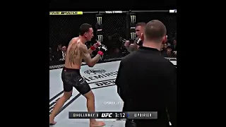 Dustin Poirier dodging punches