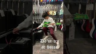 man plays forbidden riff in guitar center?