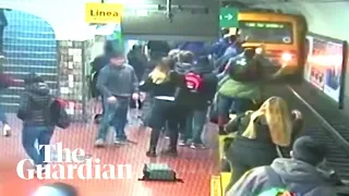 Bystanders rescue woman after she falls onto train tracks in Argentina