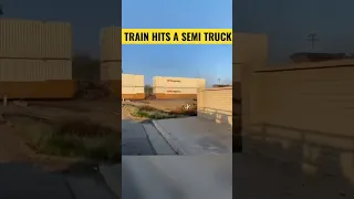 Train hits a semi truck stuck on tracks😱