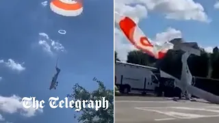 Pilot deploys parachute to slow the descent of his light aircraft as it crashes