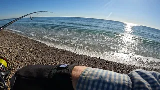 Shore jigging for big salmon on a Tasmanian beach