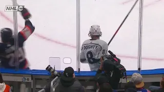 Drew Doughty laughs at Leon Draisaitl after missing the check and hitting the boards.