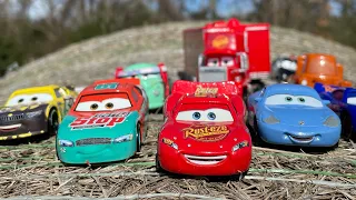 Looking for lightning McQueen, Disney Pixar cars, sheriff, Sally, tow mater, Mack, Jackson storm