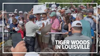 Crowds gather to watch Tiger Woods practice for PGA Championship