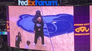 Jerry “The King” Lawler and Rikishi perform the Too Cool dance with the Memphis Grizzlies dancers