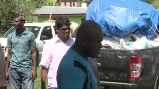 Fijian Attorney General assists Fijians in Balevuto, Ba with relief supplies.