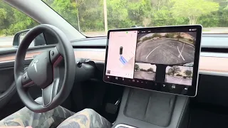 @tesla Model Y with new auto park with cameras only.