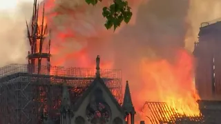 French president vows to rebuild Notre Dame cathedral