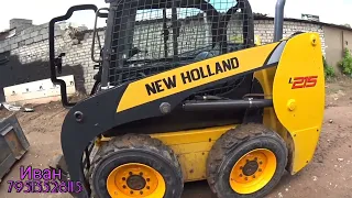 обзор  New Holland l 215