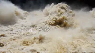 White waters and tumbling flow at Burdekin Falls dam outlet in 2022