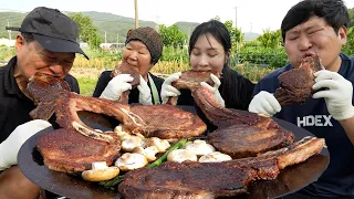 Big size Tomahawk steak grilled on a cauldron lid - Mukbang eating show