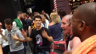 Sundar Nitai Prabhu Chants Hare Krishna in the Midst of a Crowd and Several Dance