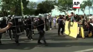 Violent clashes as police confront protesters outside stadium