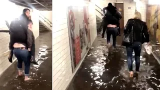 Commuters Wade Through Floods At Moorgate Station