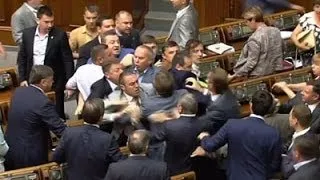 Raw: Lawmakers Scuffle in Ukraine's Parliament