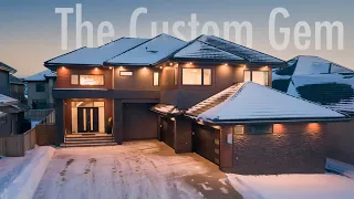This home will amaze you!! "The Custom Gem"