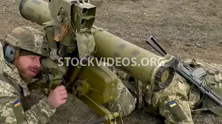 soldier aiming Ukrainian SKIF anti-tank...