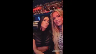 Kim Kardashian with Khloe Kardashian and friends at Usher's concert