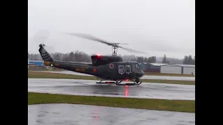 Bell 212 Helicopter Takeoff Rainy Day