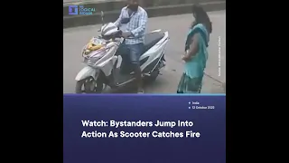 Watch: Bystanders Jump Into Action As Scooter Catches Fire