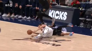 Jokic and Morant Dive on the floor for a loose Ball
