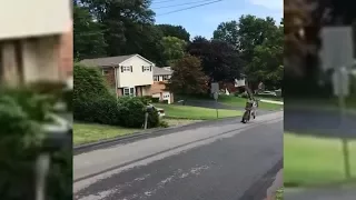 Dirt Biker Does A Wheelie And Falls On His Back