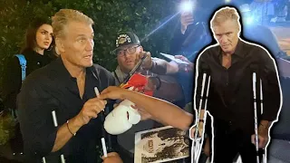 Injured Dolph Lundgren Patiently Handles Group Of Rowdy Autograph Seekers