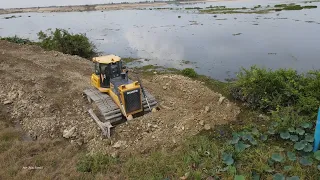 Fantastic construction new road building across lake Bulldozer, Dump truck and Roller best working