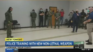 Police training with new non-lethal weapon