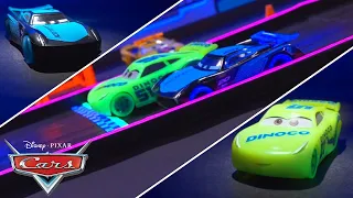 Jackson Storm Challenges Cruz Ramirez at the Glowing Racetrack | Pixar Cars