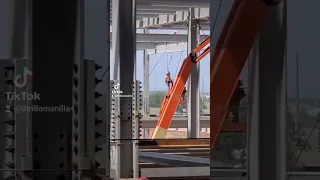 Ironworker falls off the beam. Harness retractable saves him.  #ironworker #construction